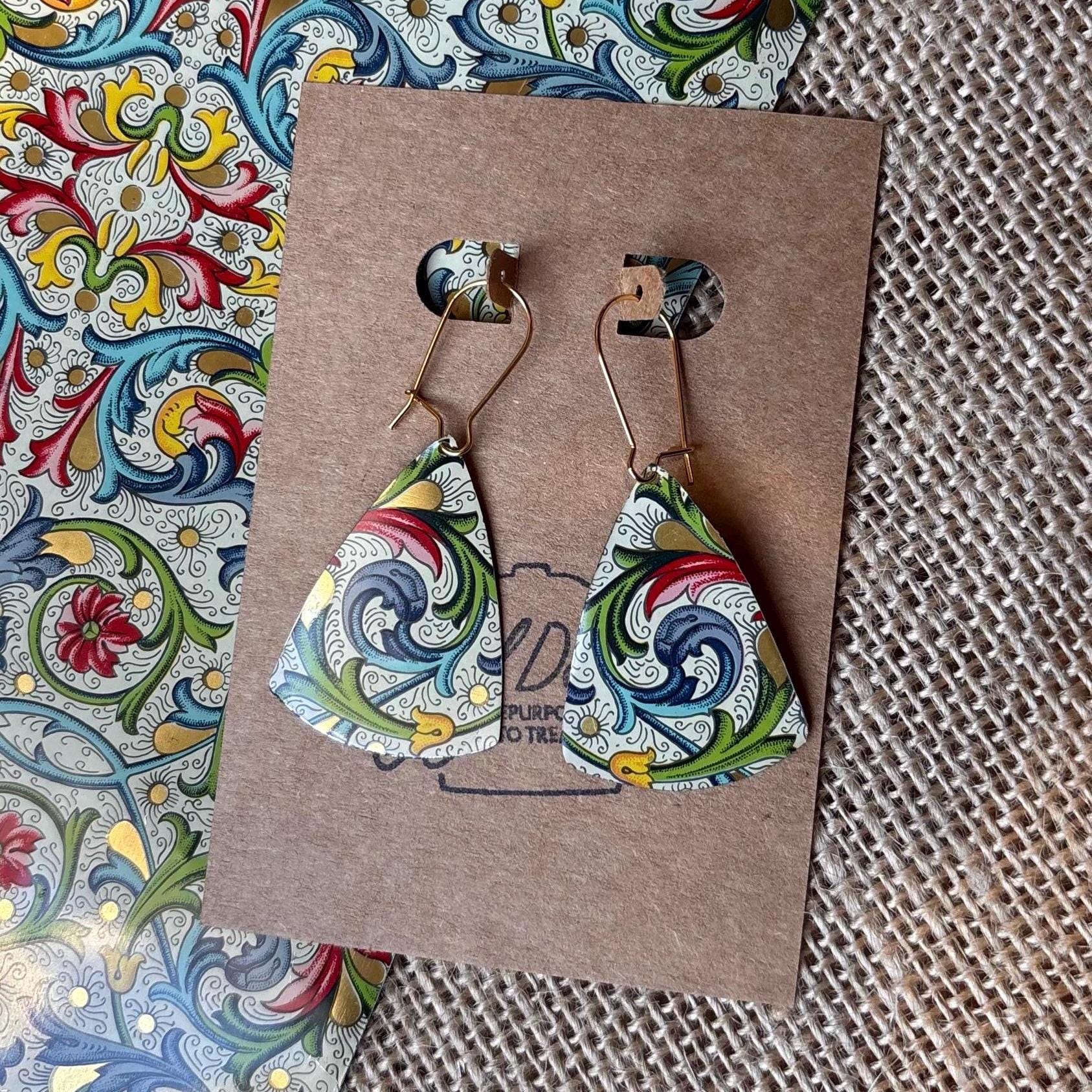 Colorful triangular earrings made from a recycled tin 